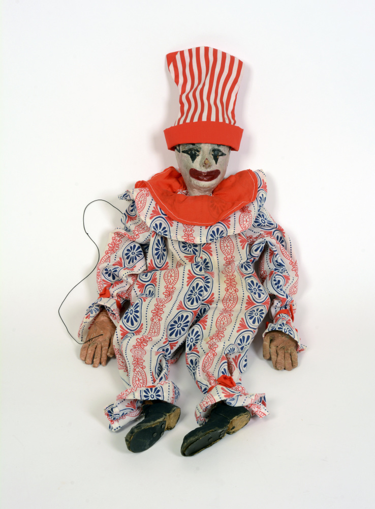 Clown Marionette. Image showing a clown-like marionette made of wood, paint, and strings, by Alma Thomas.