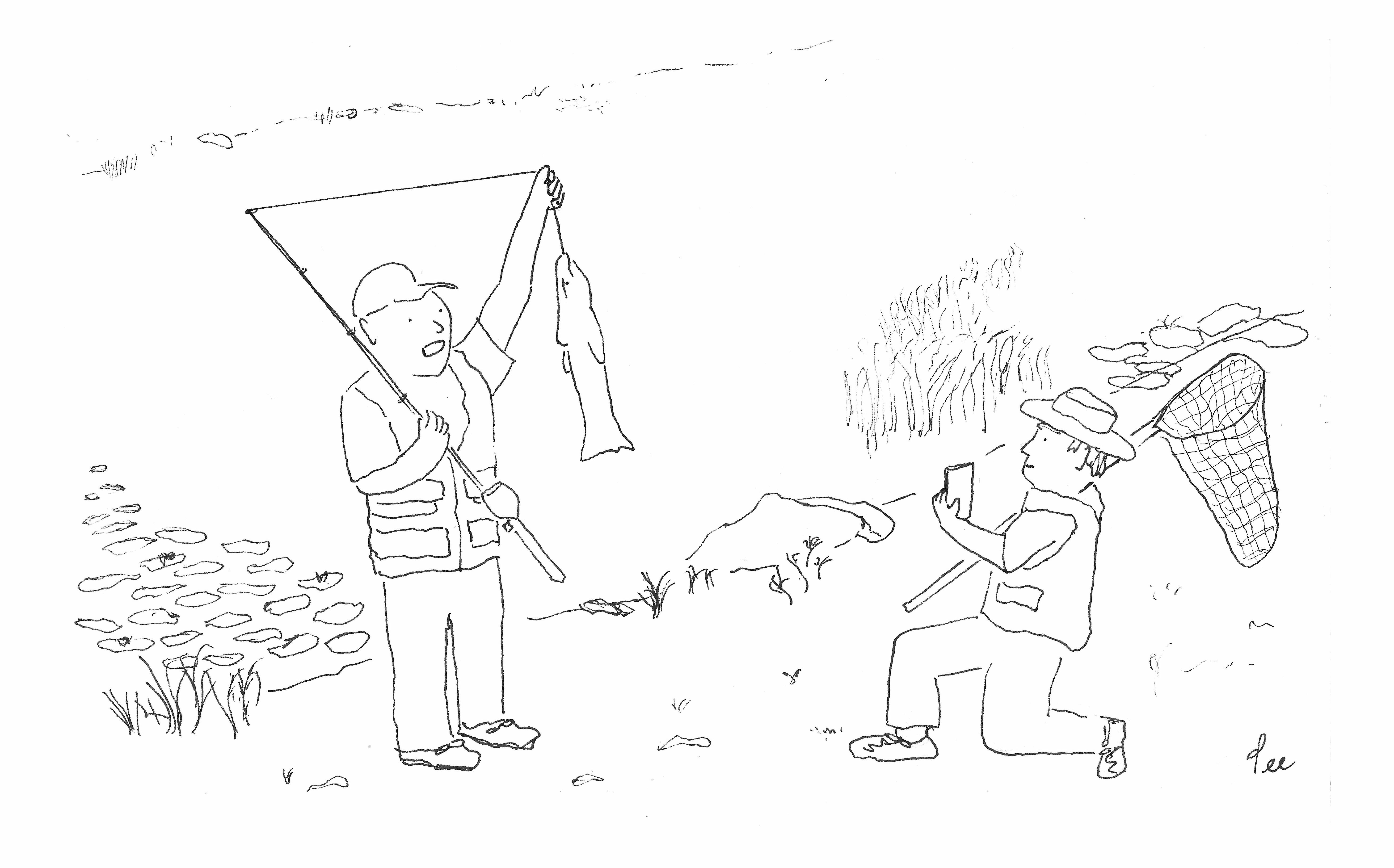 A man holding a net and a phone kneels to photograph a man in fishing gear holding a large fish