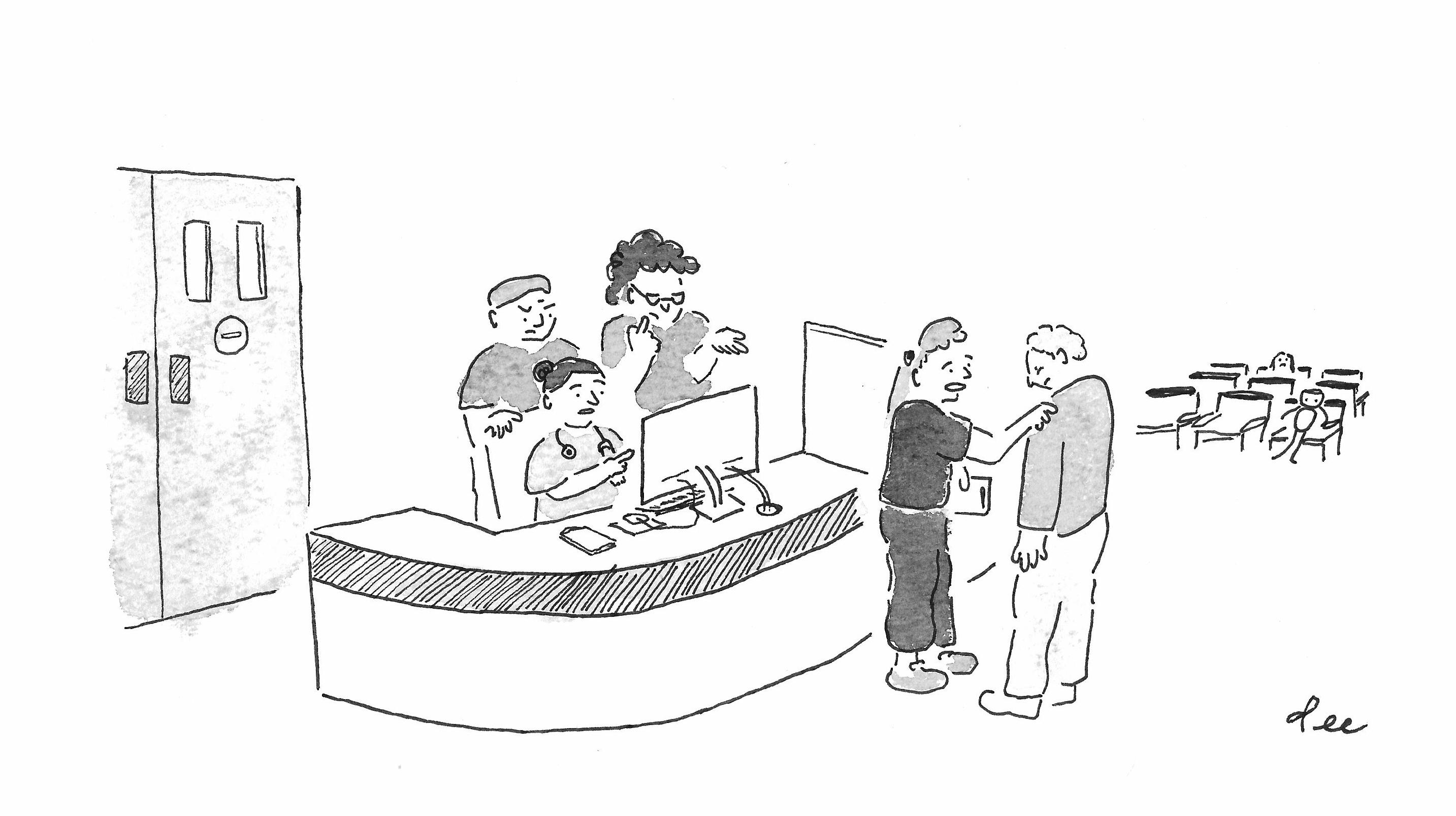 A man stands with their head hanging low. A group of medical staff with discerning looks congregate at a computer near a reception area. A nurse puts her arm on the man’s shoulder and says… 