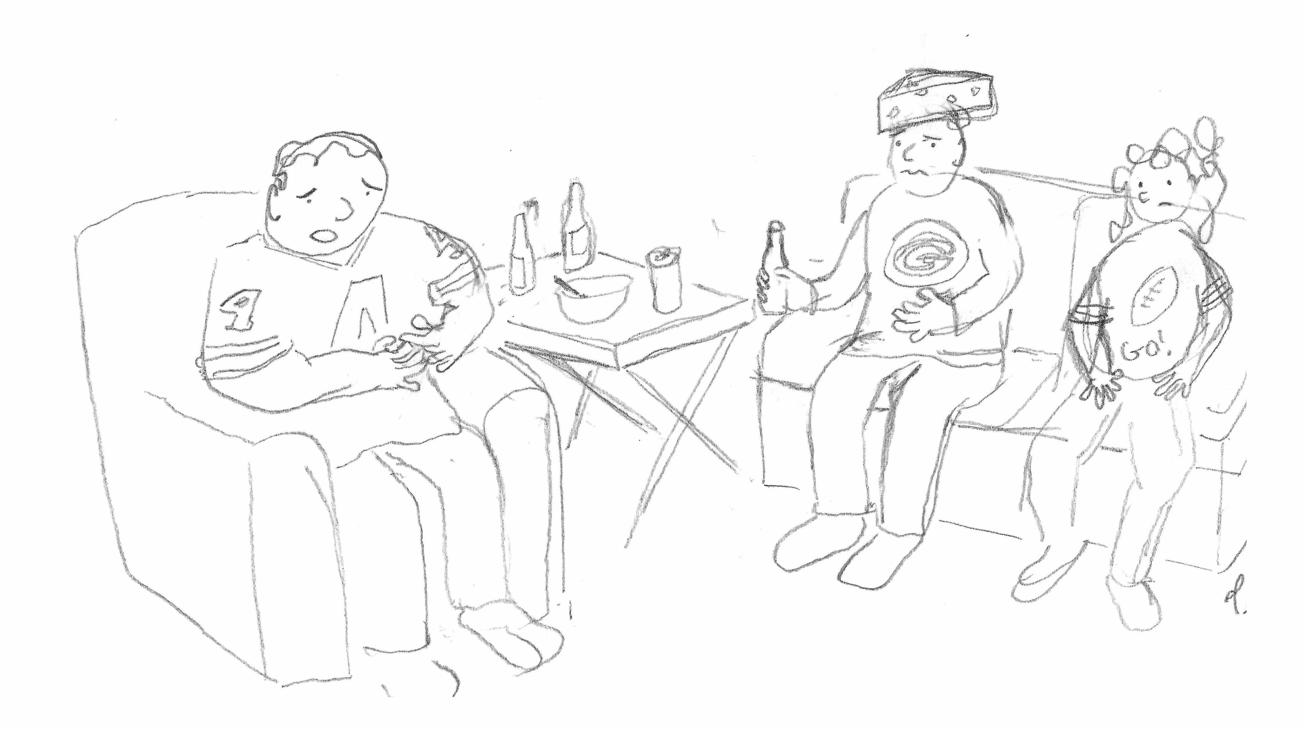 A group of people in football apparel sit with one looking particularly distressed. Bottles and a bowl rest on a nearby table.